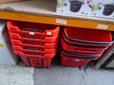 Lot 23 - 10 red poly shopping baskets