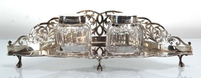 Lot 355 - A pierced silver two bottle desk stand of...