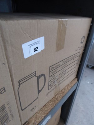 Lot 82 - 24 Tennessey handled drinking jars