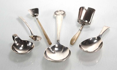 Lot 365 - A group of silver caddy spoons and scuttles...