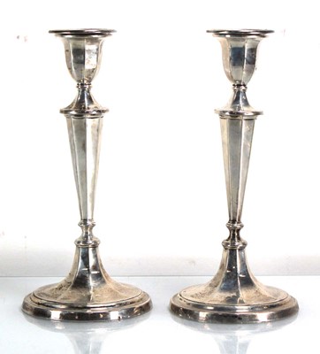 Lot 367 - A pair of Edwardian silver candlesticks of...