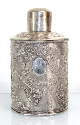 Lot 370 - A Japanese Export metalware tea caddy repousse...