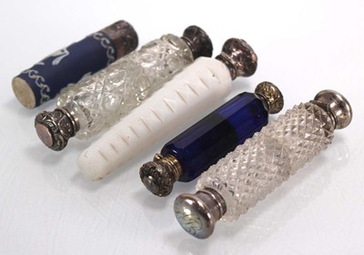 Lot 371 - Five silver mounted scent bottles including a...