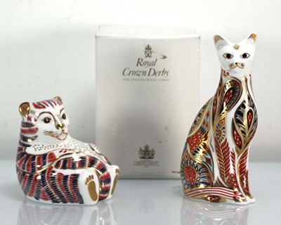 Lot 205 - Two Royal Crown Derby paperweights modelled as...