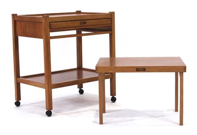 Lot 248 - A 1960's beech tea trolley containing two...