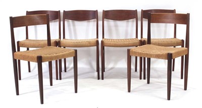 Lot 250 - A set of four Danish teak and papercord dining...