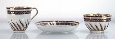 Lot 222 - A Royal Crown Derby trio decorated with with...