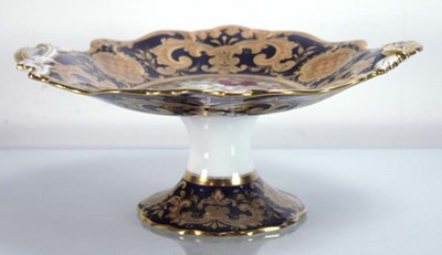 Lot 225 - A two handled tazza centrally decorated with a...