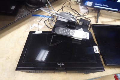 Lot 2306 - Technika 16" TV with stand and remote