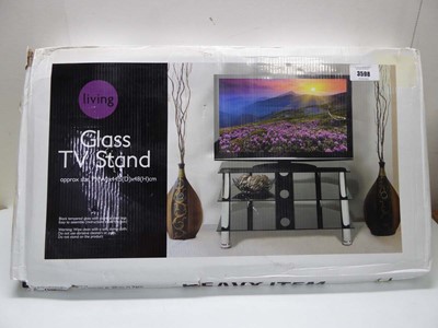 Lot 3598 - Glass TV stand