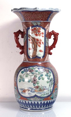 Lot 243 - A Chinese Export two handled vase decorated...