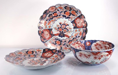 Lot 249 - A pair of Japanese scalloped edge charges...