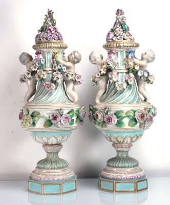 Lot 253 - A pair of Meissen style covered vases of urn...