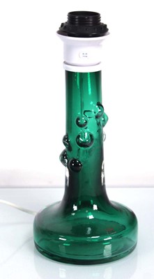 Lot 403 - A Swedish green glass table lamp base by Kosta...