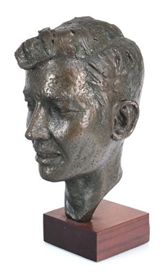 Lot 404 - A 1960's bronzed sculpture of a gentleman's...