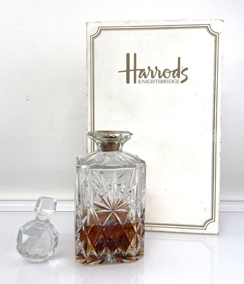 Lot 27 - An old bottle of Harrods 12 year old Deluxe...