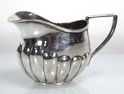 Lot 376 - A late Victorian silver cream jug with...