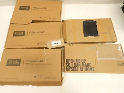 Lot 2438 - 5x boxed routers