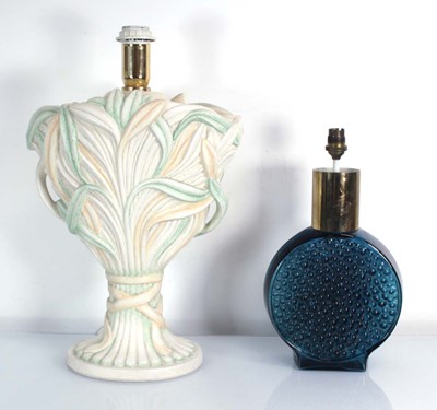 Lot 434 - A 1970's glass lamp base with dimpled body, in...