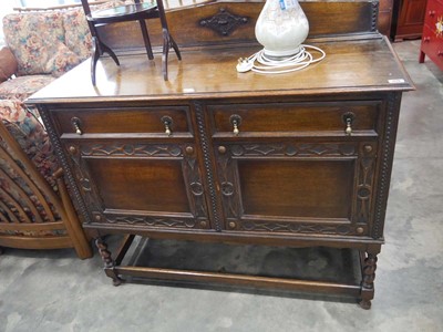 Lot 1116 - Oak decorated sideboard