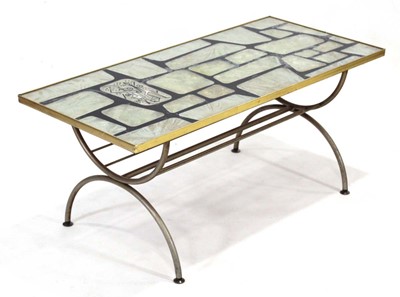 Lot 439 - A 1960's coffee table, the brass finished...