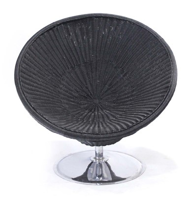 Lot 440 - A 1970/80's black wicker chair on a swivel base