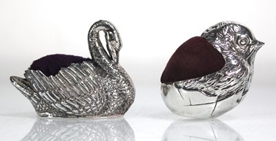 Lot 394 - A novelty silver pin cushion modelled as a...