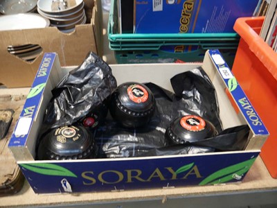 Lot 1293 - Set of 4 lawn bowls by Thomas Taylor (size 2)