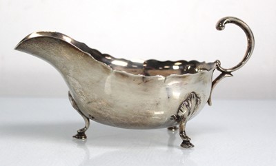 Lot 398 - A late Victorian silver sauce boat with...