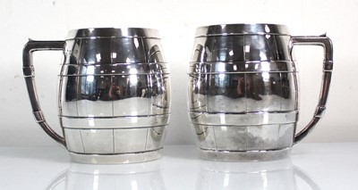 Lot 408 - A pair of Victorian silver tankards of barrel...