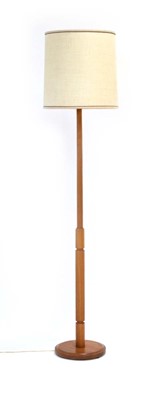 Lot 454 - A 1960's teak standard lamp, the cylindrical...