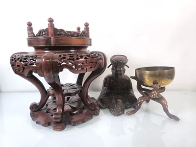 Lot 180 - A 20th century Chinese hardwood stand, h. 29...