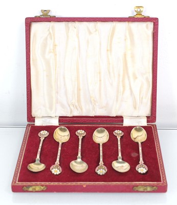 Lot 422 - A set of six silver and enamelled coffee...