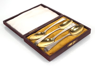 Lot 425 - A set of four George III silver and parcel...