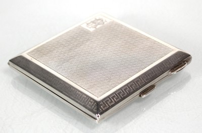 Lot 434 - A silver engine turned cigarette case of...