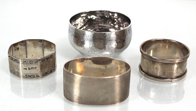 Lot 436 - Three silver napkin rings, various dates and...