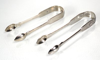 Lot 440 - A pair of fiddle and shell pattern sugar tongs,...