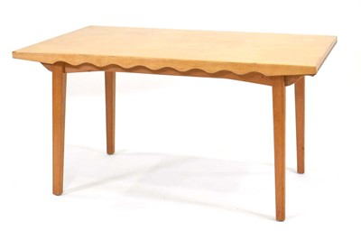 Lot 165 - A Danish oak drawer-leaf dining table designed...