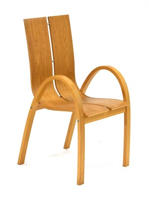 Lot 168 - A 1960's oak veneered bentwood armchair on...