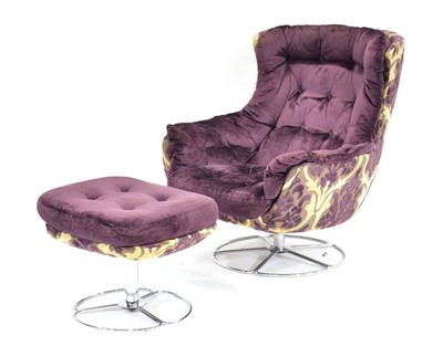 Lot 342 - A 1970's Danish armchair with purple button...