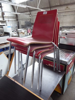 Lot 672 - 40x Red bentwood metal-framed stacking chairs