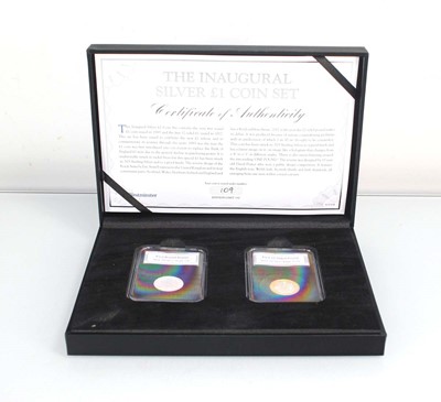 Lot 461 - A Westminster Inaugural silver £1 two-coin set,...
