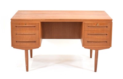 Lot 418 - A 1960's Danish teak desk with six drawers on...