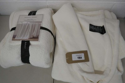 Lot 1164 - x2 Jennifer Adams boucle throws in cream