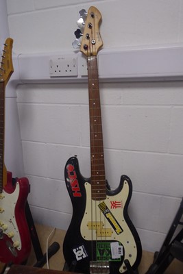 Lot 2319 - Rockwood LX90B4 string base guitar in black...