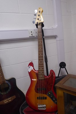 Lot 2321 - Cruiser by Crafter 4 string bass guitar in red...