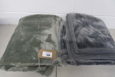 Lot 1258 - x2 large throws in green or grey