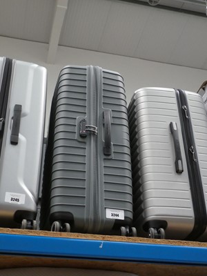 Lot 3244 - Large hard shelled American Tourister suitcase