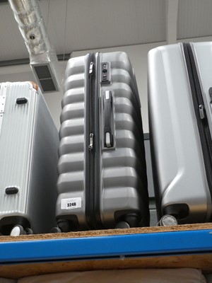 Lot 3246 - Large hard shelled triple The Rock suitcase set