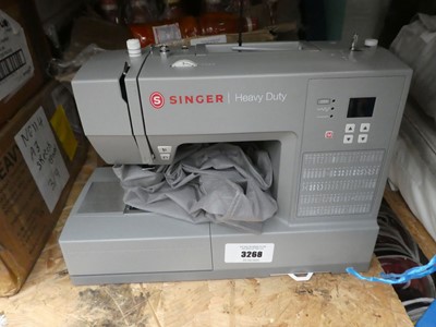 Lot 3268 - Singer heavy duty sewing machine with pedal